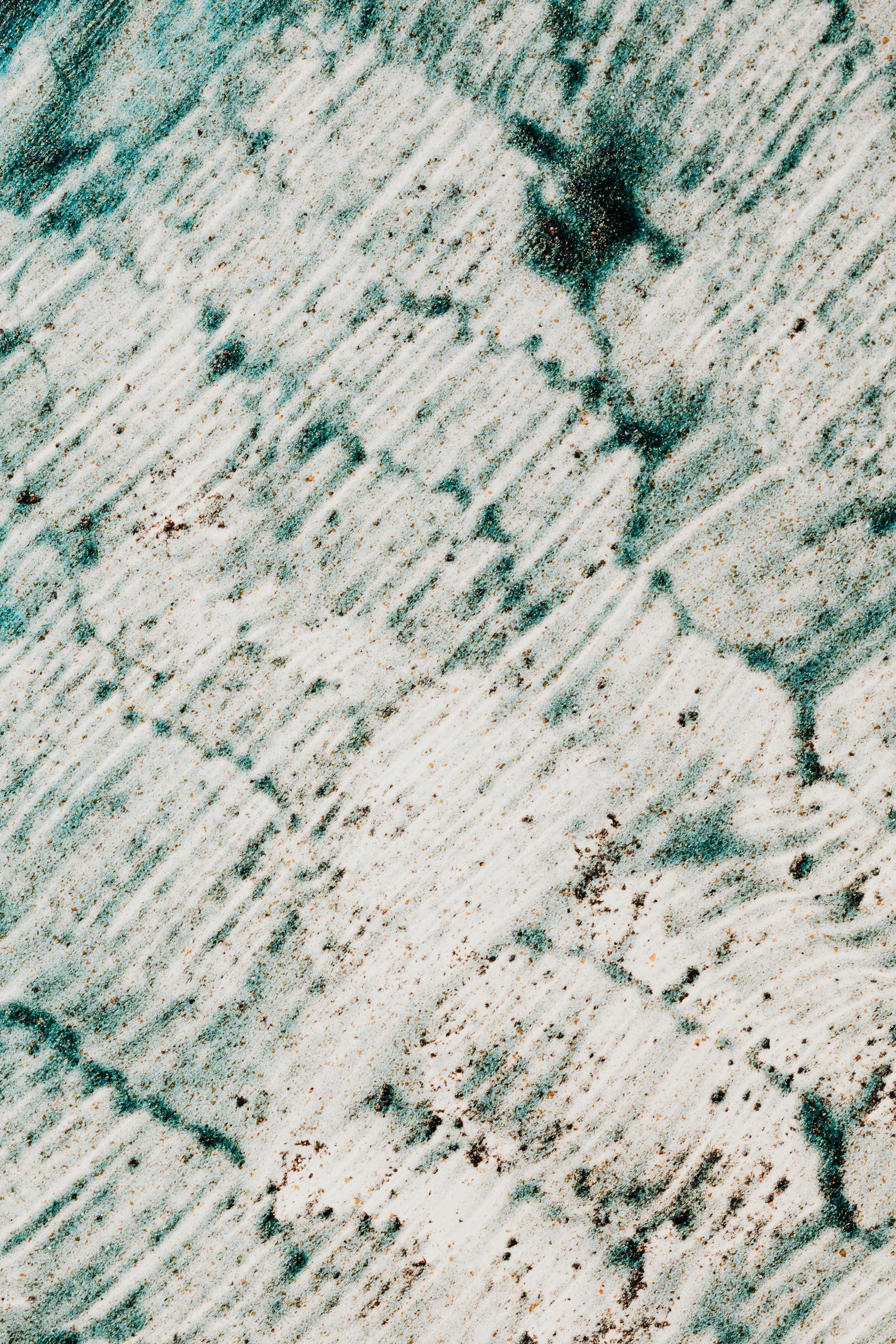 Abstract background with green paint on white surface